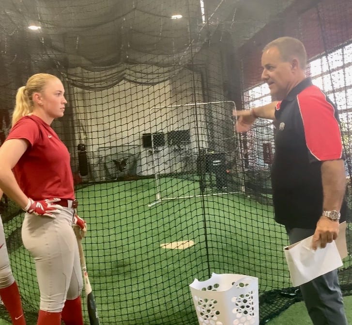 Tony Abbatine coaching a hitter one-on-one in the cage